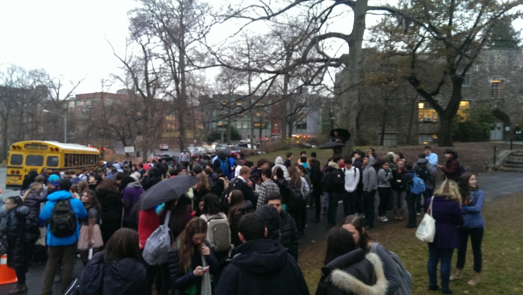 Students wait outside in the rain and 35˚ weather as FDNY and Fieldston Facilities assess the situation inside