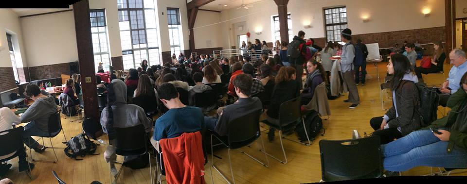 Students eagerly watch their peers perform. Photo by Charlotte Lee