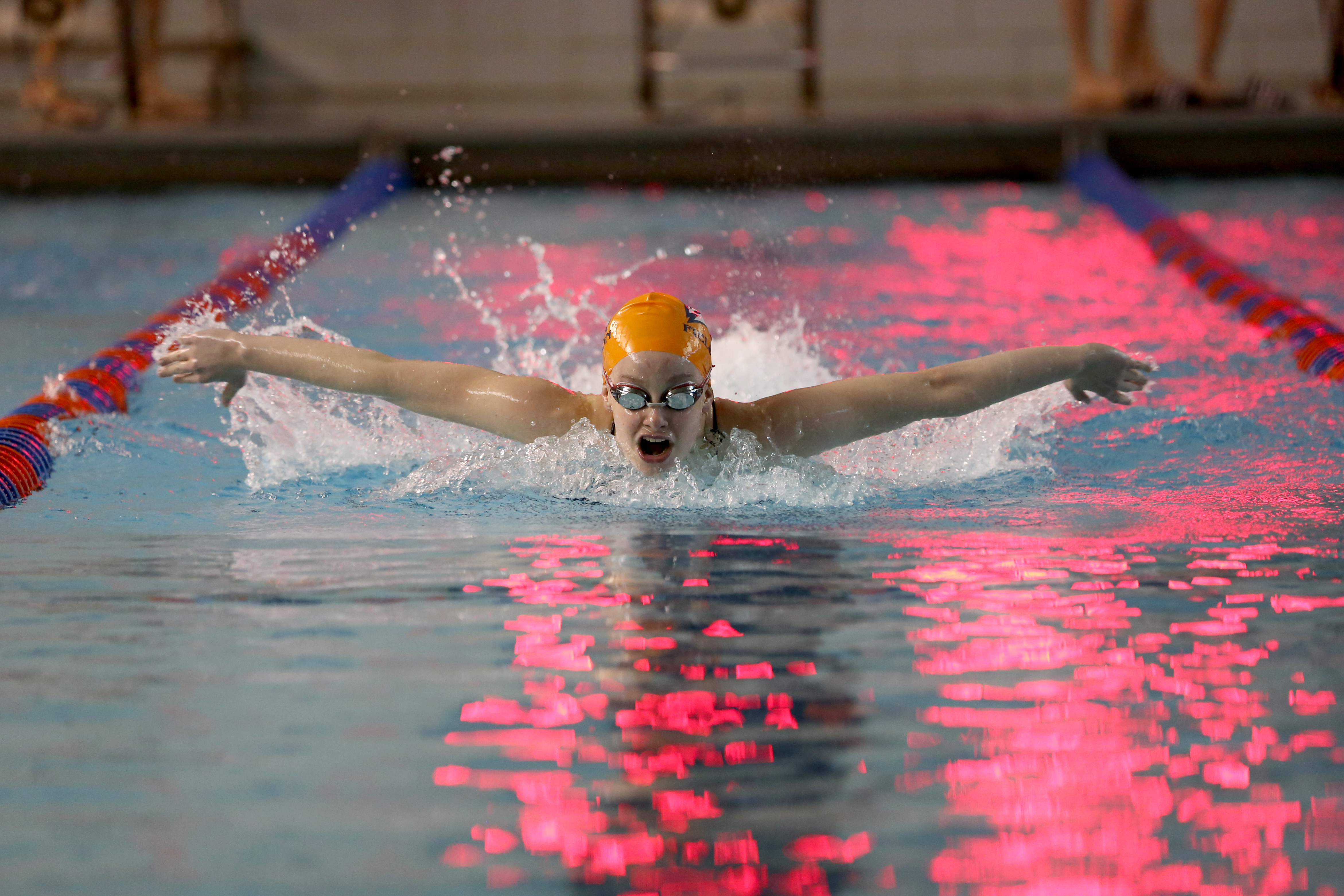 Photo by Jacob Cader: Dana Schatz (III) won the 100 meter fly event at meet against Poly Prep on Friday